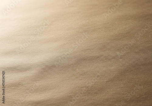 Warm tan paper texture background featuring soft, curved shadow lines, adding realistic dimension for rustic or organic design mockups