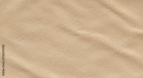 Warm tan paper texture background featuring soft, curved shadow lines, adding realistic dimension for rustic or organic design mockups