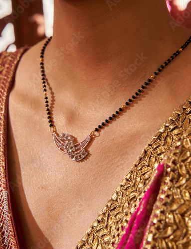 Minimalist mangal sutra necklace elegantly worn on neck with clean background