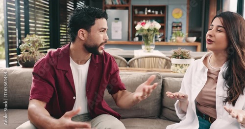 Couple, fight and unhappy with betrayal, lounge and denying cheating allegation in home or conflict. Angry, man and woman with relationship problems, shout and frustrated with infidelity accusations