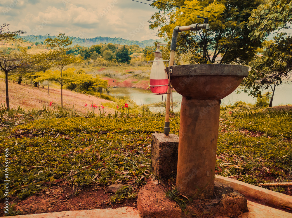 Fototapeta premium Outdoor Hand Wash Station Near Lake Park Landscape