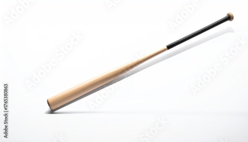 Baseball bat with black handle cast against white surface
