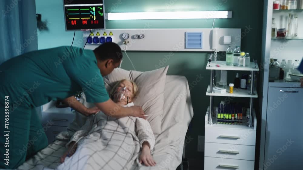 ICU medical team performing CPR on patient during emergency code blue ...