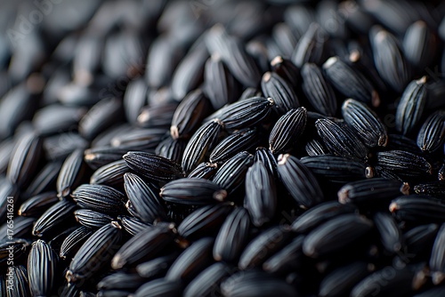 Fresh organic black rice grains with smooth texture high resolution picture
