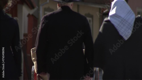 People Walking Outdoors in Vintage Setting