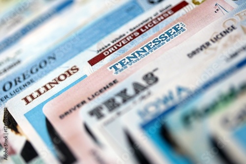 Big amount of driving licenses from various USA states. Stack of driving license specimen cards
