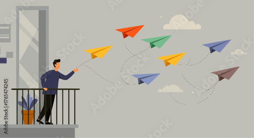 Man launching colorful paper airplanes from balcony on gray background  