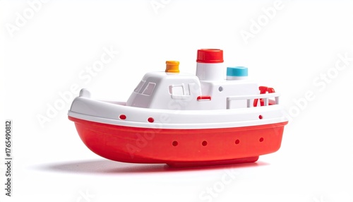 Red/white toy boat with blue/red smokestacks, isolated