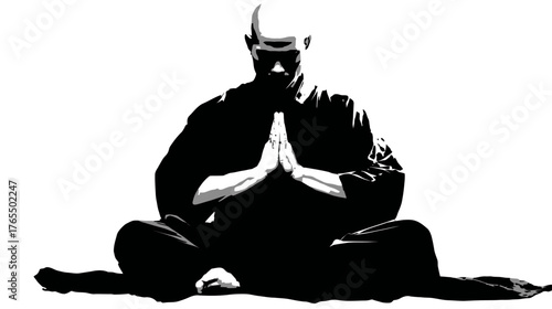 Serene person meditating in a spiritual lotus pose with hands clasped, a striking black and white silhouette for mindfulness and peace.