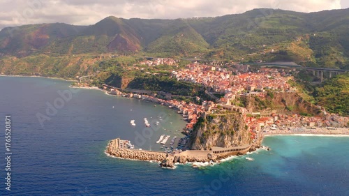 4k drone flight moving to the side footage (Ultra High Definition) of Reggio Calabria, Italy, Europe. Spectacular morning cityscape of Scilla port. Marvelous seascape of Mediterranean sea.