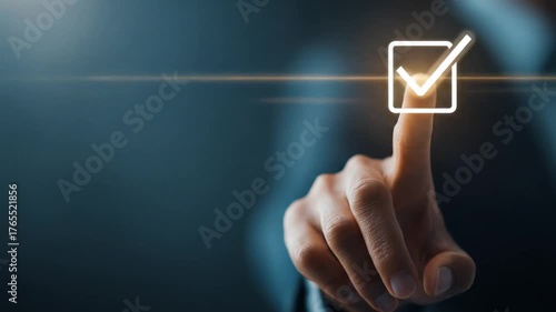 A person's index finger touching a glowing checkmark in a square against a blurred backdrop