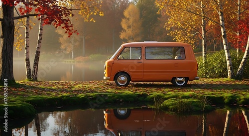 Vintage Orange Van Retreats to Lakeside Haven Amidst Autumn Splendor