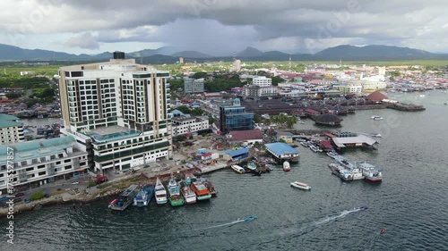 Aerial footage view of commercial pier and fisherman village at Semporna, a city on east coast of Sabah in Malaysia, Tawau District, Borneo island