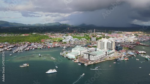 Aerial footage view of commercial pier and fisherman village at Semporna, a city on east coast of Sabah in Malaysia, Tawau District, Borneo island
