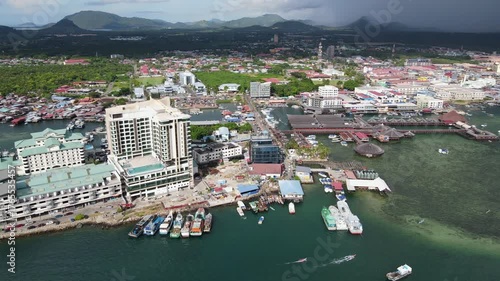 Aerial footage view of commercial pier and fisherman village at Semporna, a city on east coast of Sabah in Malaysia, Tawau District, Borneo island