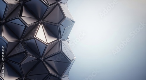Futuristic Geometric Structure with Reflective Surfaces and Copy Space