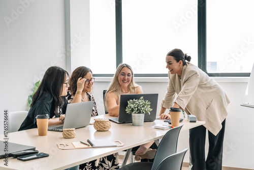 woman speaking at an office meeting