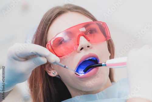 doctor orthodontist examines the patient after brushing his teeth