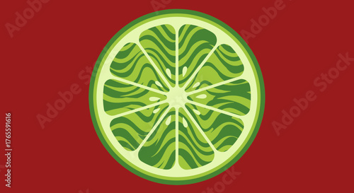 A cross section of a green and lime citrus fruit on red backdrop