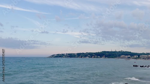 Mediterranean sea and landscape captured in famous summer village called Antibes in French riviera. It is a summer day.