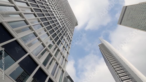 Bottom view of modern skyscrapers in Frankfurt. It shows urban architectural style and design.