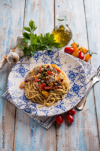 spaghetti with fresch anchovy  tomato and capers