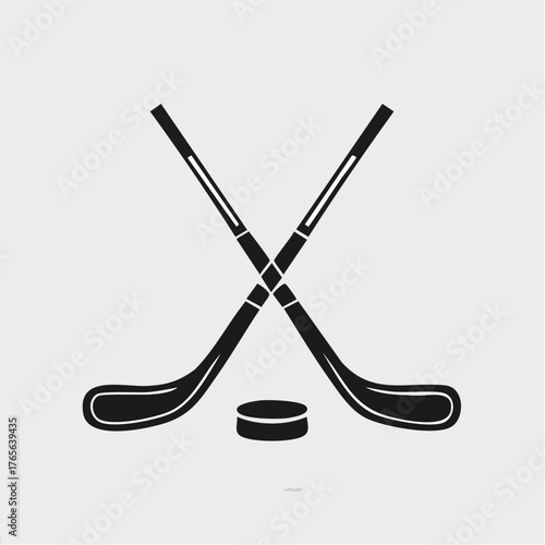 Ice hockey sticks and puck icon. Simple sport equipment vector