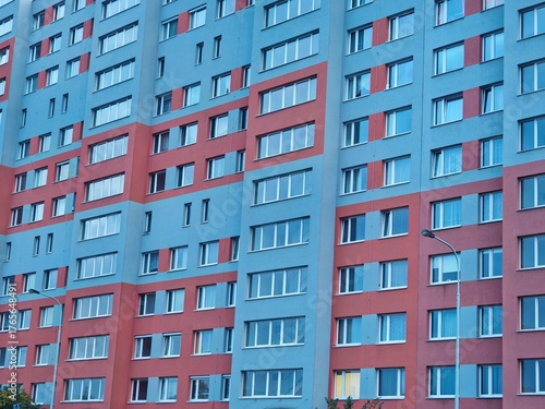 Photography Massive concrete panel buildings (panelak)from the communist era, typical of suburban housing estates on the outskirts of Prague, showcasing brutalist urban design