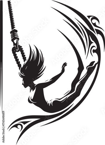 Silhouette of a female acrobat performing a daring aerial act wi
