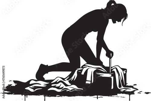 Silhouette of a determined woman handwashing clothes in a vintag