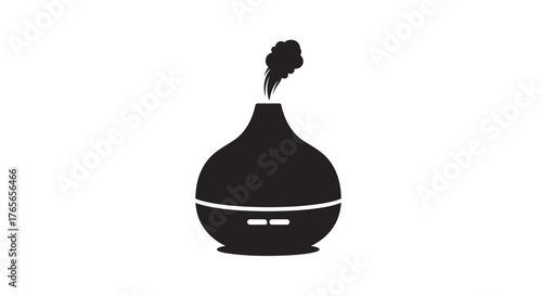 Aromatherapy Diffuser Silhouette Emitting Mist for Relaxation and Wellness.