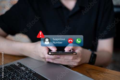 Criminal gang crime foreign illegal hacker spam scam fraud making an anonymous call on smartphone mobile phone cybersecurity online technology incoming warning fake news alert digital protection user