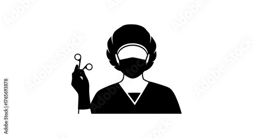 Surgeon in Sterile Gown Holding Surgical Scissors.