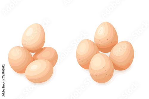 Fresh beige and speckled chicken eggs arranged in two separate groups on white