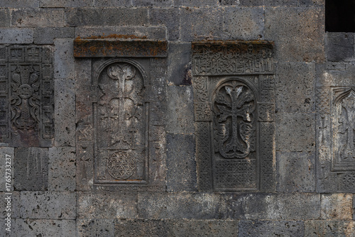 Wallpaper Mural View of ancient stone carvings etched with intricate cross patterns stand as silent witnesses on the weathered walls of Tatev Monastery, Tatev, Syunik Province, Armenia. Torontodigital.ca