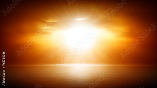 a bright orange light shines over the ocean