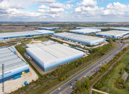 Obraz na plátně Aerial view of distribution business park warehouses in England