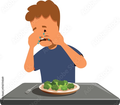 Little boy crying and refusing to eat broccoli, expressing disgust for healthy food in a funny way