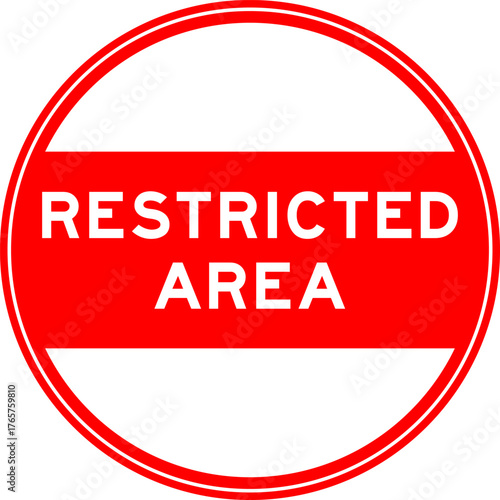 Red color round seal sticker in word restricted area on white background