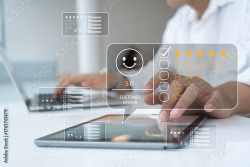 Customer review and rating concept with person using tablet and laptop, showing five-star feedback, online survey, digital marketing, user experience, customer satisfaction, and business evaluation.