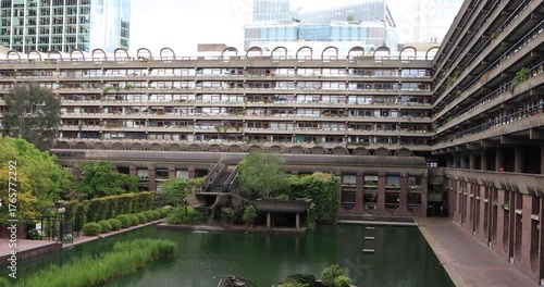 Wallpaper Mural High angle view of Barbican water garden in London: concrete walkways, planted islands and green reeds in emerald water. Torontodigital.ca