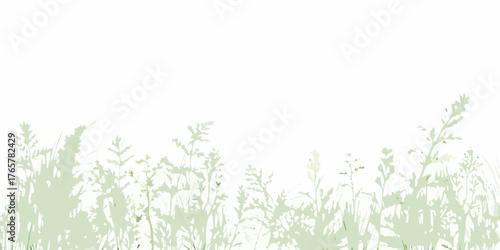 Delicate pale green grass silhouettes against a clean white background with copy space