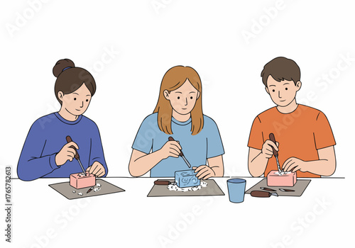 Students practicing soap carving art, engaged in a creative hobby or workshop activity.