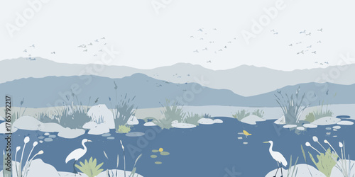 Tranquil landscape with egrets and ducks in a serene blue pond amidst mountains and reeds