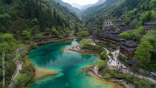 Ultra HD Panoramic view of baofeng lake and traditional houses drone video, aerial drone mountain terraced lake video, aerial drone mountain lake video