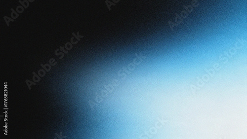 Abstract grainy gradient background with blend of black blue and white