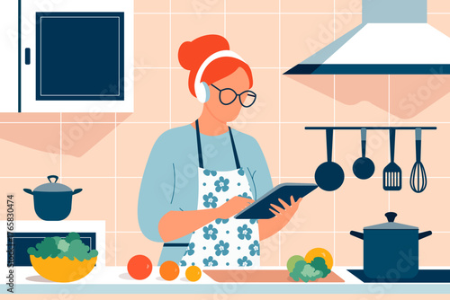 Woman using a digital device or assistive technology for visual impairment. Person cooking dinner at home with tablet, glasses and headphones for accessibility and independence