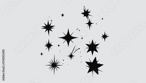 A cluster of black star shapes of varying sizes and styles on a gray background