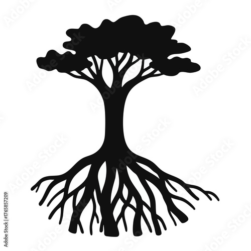 Silhouette of a majestic tree with visible roots symbolizing growth and nature's strength