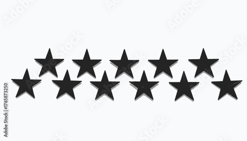 A group of dark stars forming an arc on a white background, creating an attractive visual